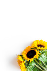 Sunflower frame on white background top view copyspace