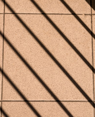 Shadow bars on the pavement