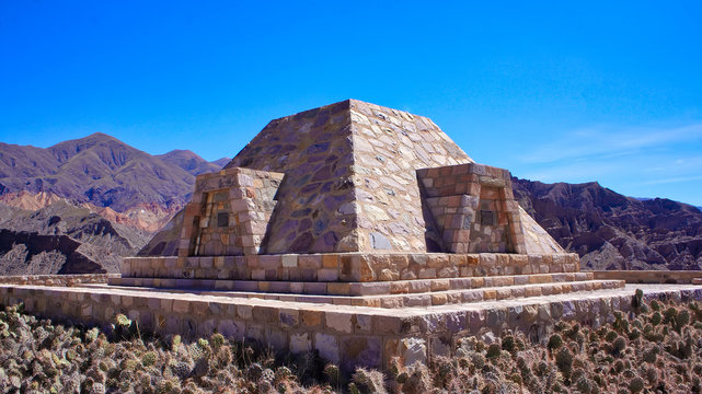 Scenic colorful mountains of Quebrada de Humahuaca and ancient ruins of Tilcara village in Argentina