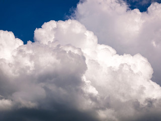 Obraz premium Heavy rain clouds on a blue sky