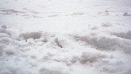 Obraz premium Degraded footprints in deep snow