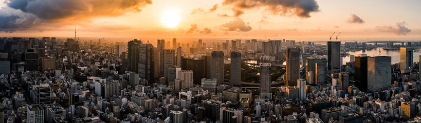 Obraz premium Aerial Drone Photo - Skyline of the city of Tokyo, Japan at sunrise. Asia