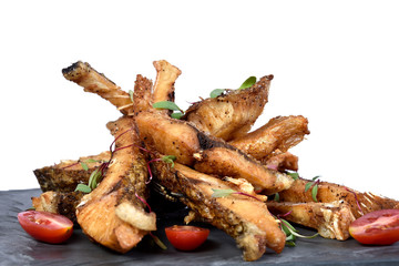 fried fish strips served on stone
