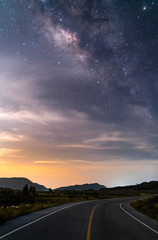 Beautiful night sky on hight way with galaxy milky way and mountain background.