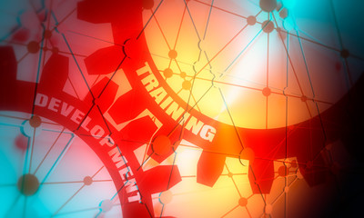 Naklejka premium Training and Development text on the mechanism of gears. Communication concept in industrial design. Modern brochure design template