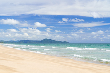 Tropical beach with clouds and blue sky. Beautiful beach at Thailand.
