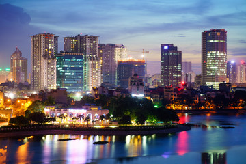 Fototapeta na wymiar Aerial skyline view of Hanoi. Hanoi cityscape at twilight at Hoang Cau lake