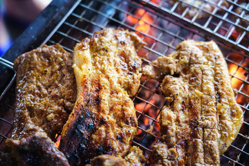 Meat on the grill with flame. Outdoor bbq