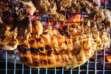 Meat on the grill with flame. Outdoor bbq