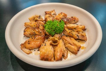 Delicious and well-decorated dish of grilled chicken in Korean style