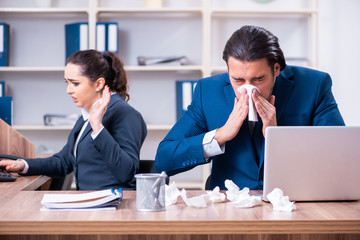 Two employees suffering at workplace
