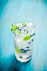 Blueberry mojito cocktail. Selective focus. Shallow depth of field.