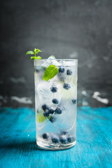 Blueberry mojito cocktail. Selective focus. Shallow depth of field.