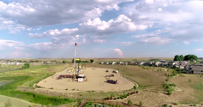 A drone shot illustrates the proximity of oil and gas drilling to the lives of everyday Colorado citizens - even in the nicest of neighborhoods.
