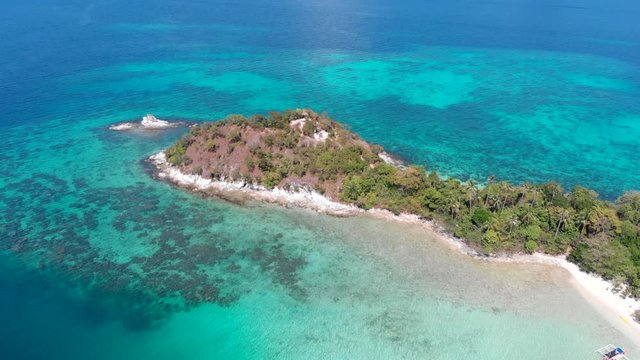 Aerial forward shot of A Tropical Vigan Island, El Nido, Palawan, Philippines.
