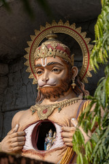 Fototapeta premium Hanuman statue, Hindu idol near Ganges River, Rishikesh, India. Sacred places for pilgrims