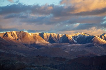 Himalayan mountain landscape along Leh to Manali highway during sunrise. Rocky mountains in Indian Himalayas, India