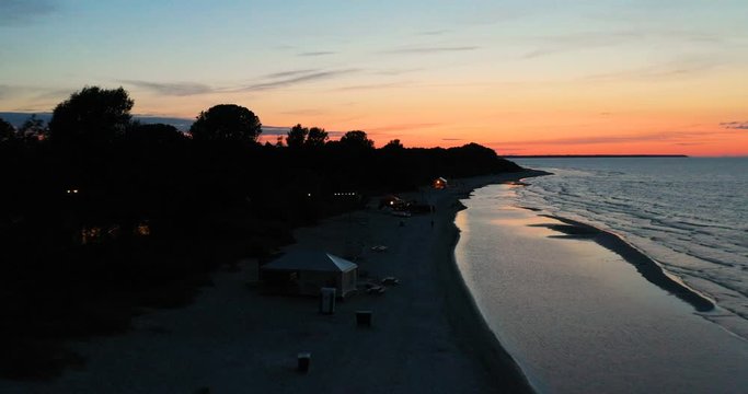 Aerial view wonderful dark silver sea with sunset twilight sky in the evening time. Scenery moment. spirit of serene and zen. image for background, wallpaper, interior