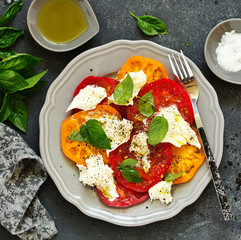salad of tomato, mozzarella and basil. Italian food.