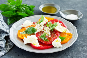 salad of tomato, mozzarella and basil. Italian food.