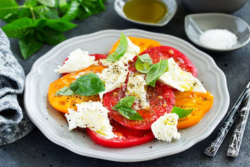 salad of tomato, mozzarella and basil. Italian food.