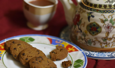 Cookies with Cup of Tea and Teapot