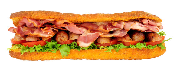 Sausage and bacon filled ciabatta bread sandwich with lettuce and tomato isolated on a white background