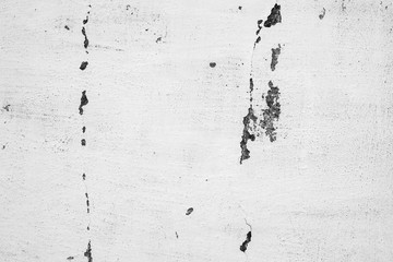 Texture of a concrete wall with cracks and scratches which can be used as a background