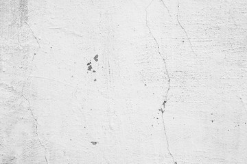 Obraz premium Texture of a concrete wall with cracks and scratches which can be used as a background