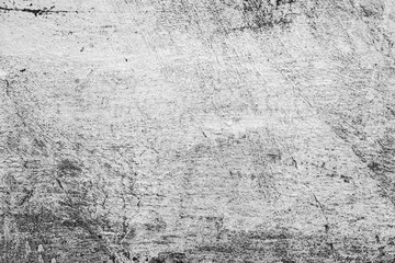 Texture of a concrete wall with cracks and scratches which can be used as a background