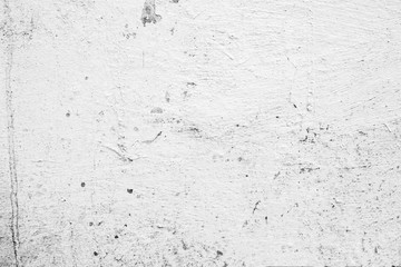 Texture of a concrete wall with cracks and scratches which can be used as a background
