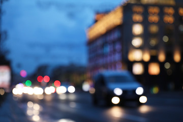 Blurred view of modern city at evening. Bokeh effect