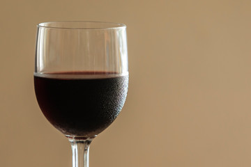 special red wine in glass as background