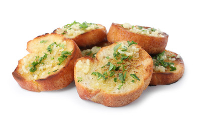 Slices of toasted bread with garlic and herb on white background