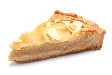 Piece of delicious sweet pear tart on white background