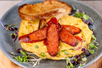 Spanish Omelette topped with slices of grilled chorizo