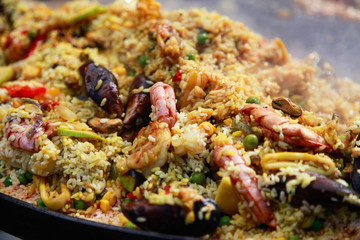 Typical spanish seafood paella in traditional pan