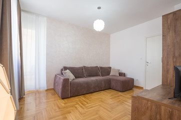 Interior of an open plan apartment, living room