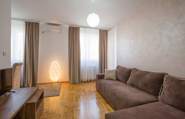 Interior of an open plan apartment, living room