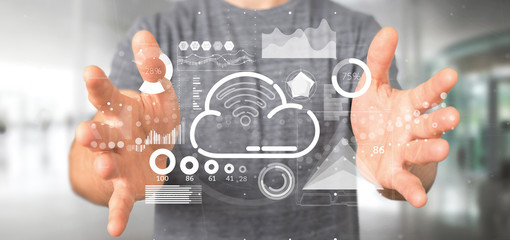 Businessman holding Cloud and wifi concept with icon, stats and data 3d rendering