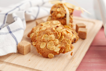 Stack of crunchy tasty cookies on a kitchen table close up