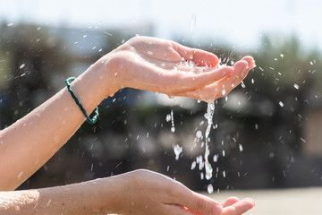 Fototapeta premium Female hands under running water