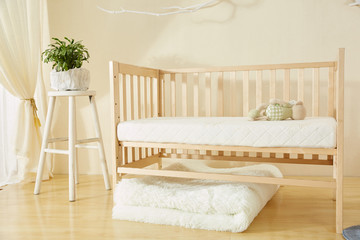 Beautiful interior of baby room with white crib