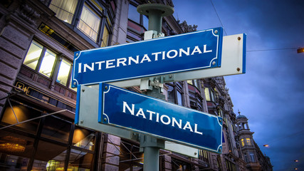 Street Sign to International versus National