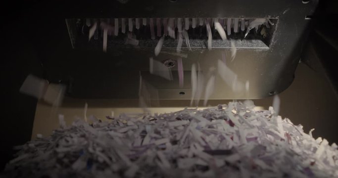 Shredder Cutting Paper From Below, Full Basket, Hard Light