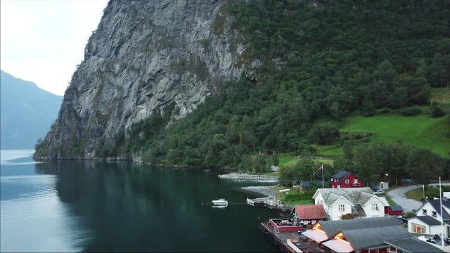 Drone shots of the village of Undredal wich is located in a fjord in Norway.