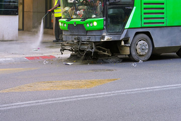 Street sweeper machine working. Street cleaning machine