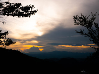Landscape view of complex mountain with sunset in the evening in northern of Thailand.