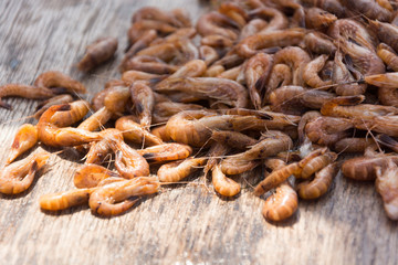 View on a heap of freshly cooked and delicious shrimps, just caught in the Wadden Sea, the Netherlands. A wonderful catch of the day. The shrimps were cooked on board of a vessel.