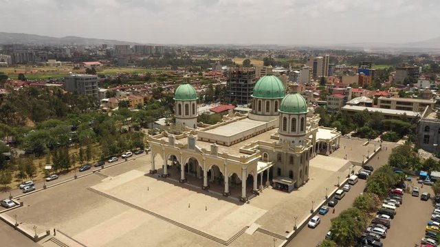Rotating drone shot flying around beautiful Medhane Alem cathedral in Addis Ababa, Orthodox Christian religion in Ethiopia